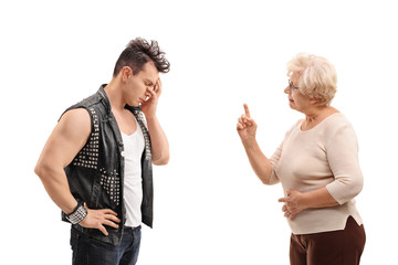 Senior woman arguing with a punker