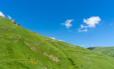 Beautiful mountain landscape, with mountain peaks covered with g