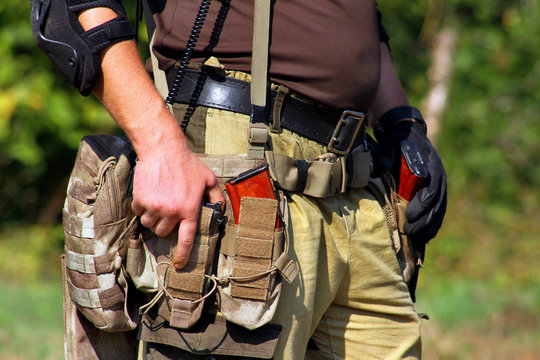 Rapid Response Team Soldier Preparing To Fire A Pistol