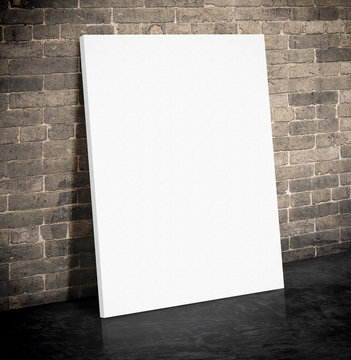 Blank white paper poster on the grunge brick wall and black ceme