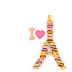 Macaron cake Eiffel Tower. Sweet french dessert macaron. Delicious cake macaron for breakfast lunch or date. Colorful Macaron of different tastes and Valentines hearts, close up. Love, Valentines Day