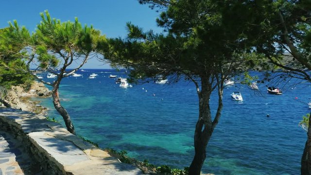 Steadicam POV view shot: A picturesque bay with boats and yachts in the Mediterranean resort in Spain
