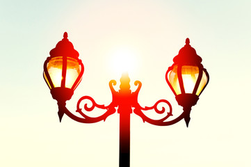 Beautiful vintage Street antique style lamp post with effect of