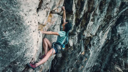 Keuken spatwand met foto Woman with outfit climbing the rock © Alex Photo