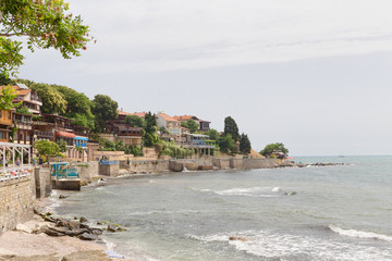 NESSEBAR, BULGARIA, JUNY 18, 2016: Nessebar promenade with cozy cafes and small beaches