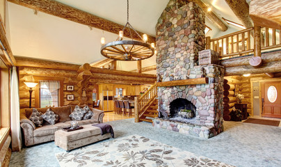 Bright Living room interior in American log cabin house.