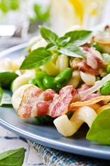 Pasta with bacon and vegetables