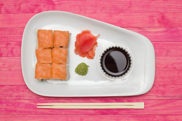 sushi  set on white plate with wasabi and  ginger