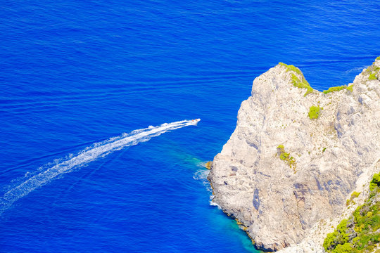 Speed boat sailing along the coast in Zakynthos, Greece