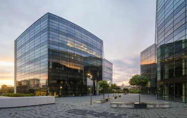 Tuinposter Modern office building in the evening   © Mike Mareen