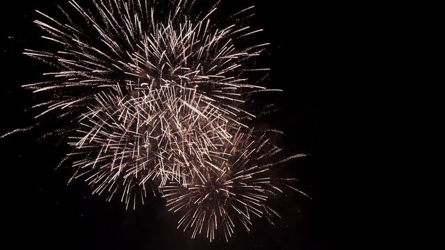 Multiple fireworks explosion.