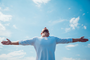 The man held out his hands to the sky. Freedom.