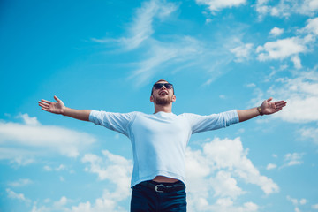 The man held out his hands to the sky. Freedom.