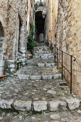 Narrow cobbled street  in the old village France.