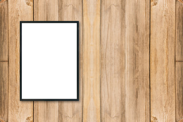 Mock up blank poster picture frame on wood wall.