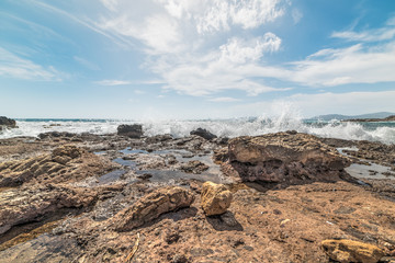 Fototapeta na wymiar waves on the rocks