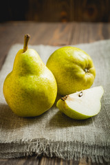 Fresh ripe pears on a table with napkin