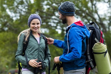 Hiker couple talking to each other