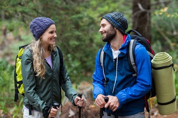 Hiker couple interacting with each other