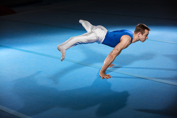 portrait of young man gymnasts - 116870261
