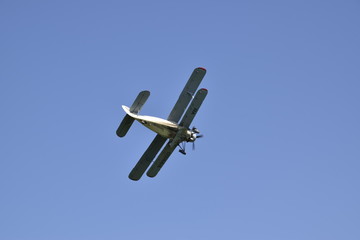 The spraying of fertilizers and pesticides on the field with the aircraft.
