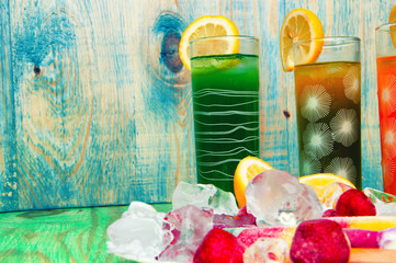 Fruit juices and ice cream concept on abstract background