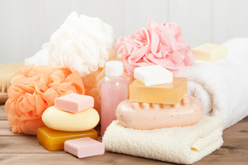 Obraz na płótnie Canvas Soap Bar And Liquid. Shampoo, Shower Gel. Towels. Spa Kit.
