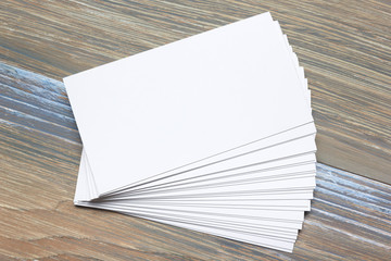 Business card blank over office table. Corporate stationery branding mock-up