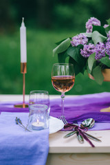 beautifully served table outdoor with flowers and decor