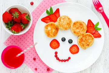 Baby girl breakfast. Appetite fun food art for children