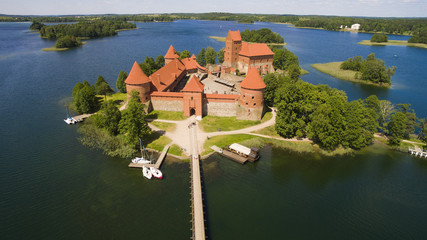 AERIAL. Beautiful old castle in Trakai from the sky, summer day