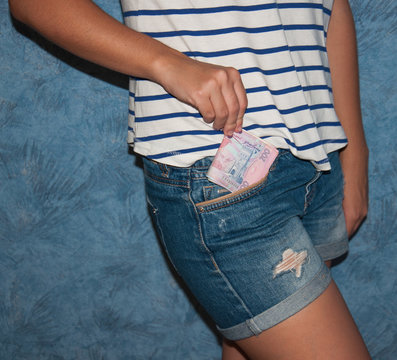 Money In The Jeans . To Lay Down The Money In His Pocket.