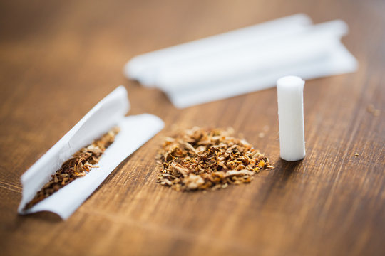 close up of marijuana or tobacco cigarette paper