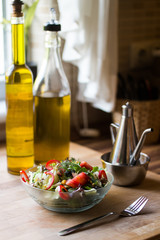 Fresh salad with tomatoes and olive oil