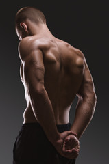 Fototapeta na wymiar Healthy muscular young man. Sport portrait.