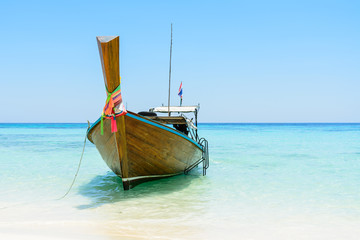 Naklejka na ściany i meble Thai longtail boat on the beach, Andaman sea, Koh Rok island, Th