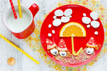Funny breakfast idea for kids - marshmallow with fruit and cookies