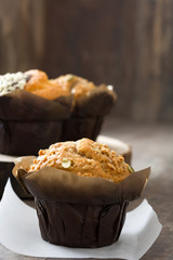 Muffins on a rustic wooden table

