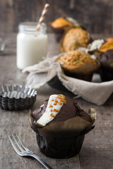 Muffins on a rustic wooden table

