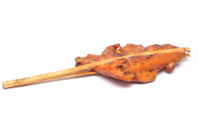 Hot chickens plugged with bamboo