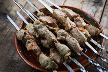 Shish kebab on the wooden table