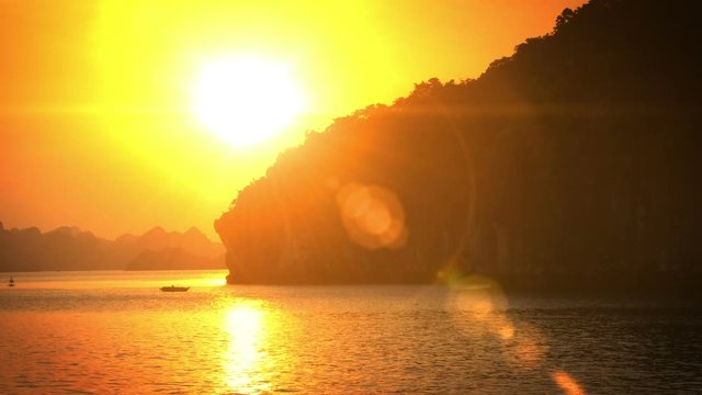 Sailing past some of the many tropical islands of Halong Bay Vietnam.