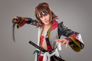 Japanese samurai with katana sword. Studio shoot. Isolated.