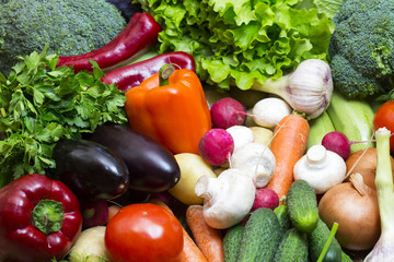 Background of fresh vegetables and greens closeup