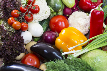 Background of fresh vegetables and greens closeup