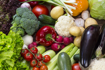Background of fresh vegetables and greens closeup