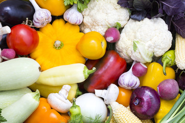 Background of fresh vegetables and greens closeup