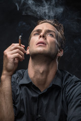 Portrait of man with cigarette