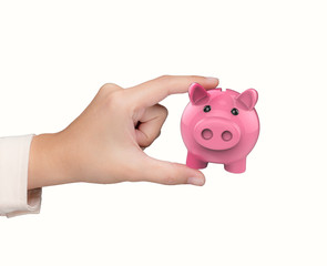 hand holding piggy bank
