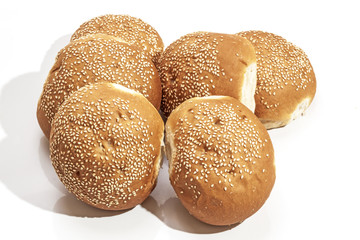 Six Hamburger Buns Covered with Sesame Seeds